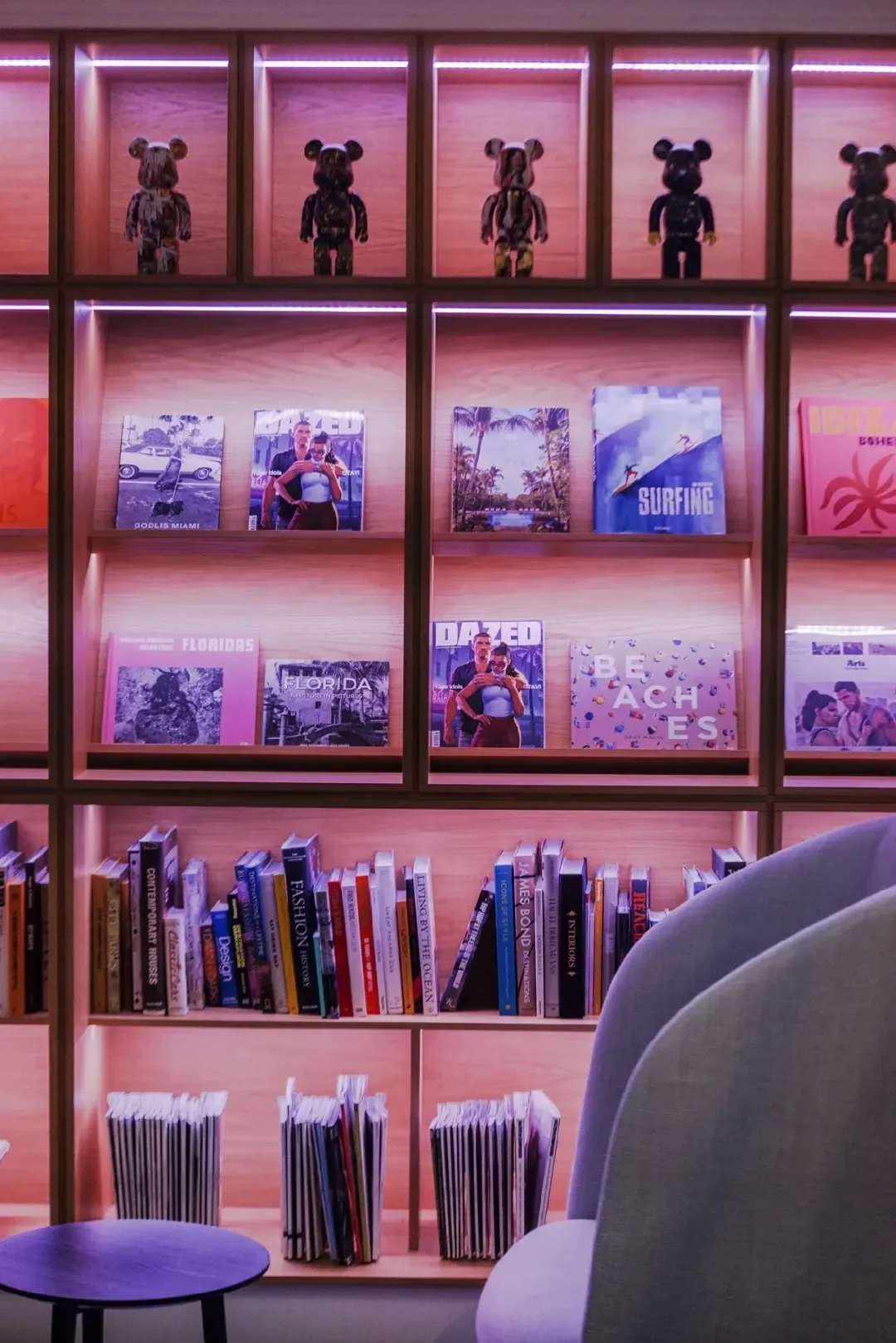 Games and collectibles displayed inside a Rockstar office